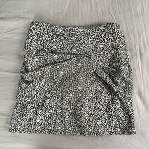Leopard print miniskirt with ruche bow size small